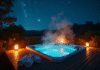 Jacuzzi extérieur chaud la nuit sous un ciel étoilé